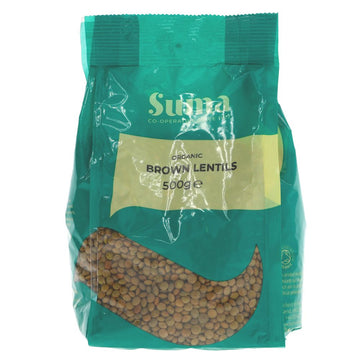A recyclable green plastic packet of brown lentils