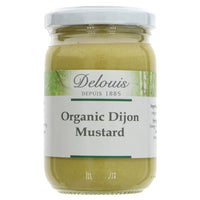 A glass jar of organic dijon mustard with a metal lid