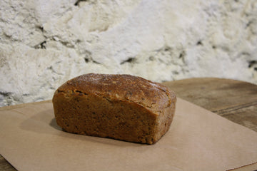 A loaf of rye multiseed bread