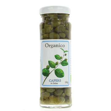 A small glass jar of organic capers with a metal lid