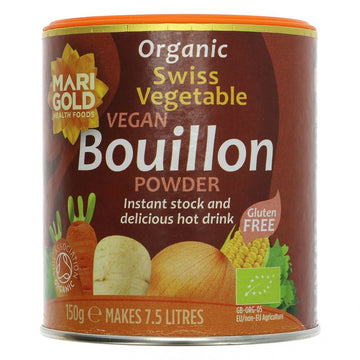 An orange cardboard tub of vegan bouillon powder with a plastic lid