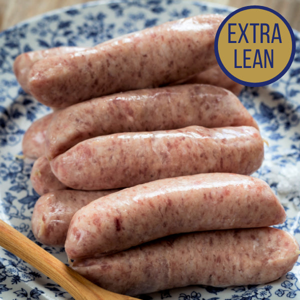 A photo of Puddledub pork & apple sausages. Not organic. 300g