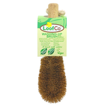 washing up brush made with coconut fibres. Has a wooden handle.