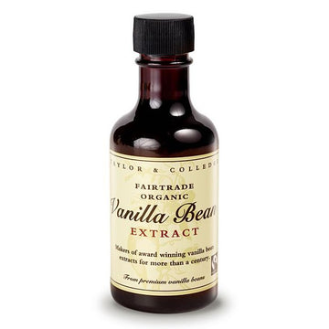A small brown bottle with cream label. Vanilla bean extract - organic