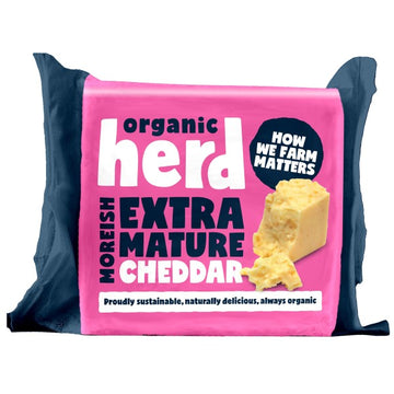 vibrant pink packaing containing extra mature cheddar cheese from organic herd