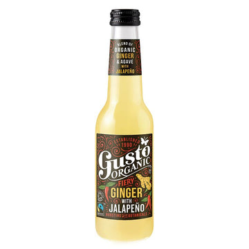 Glass bottle with lemon yellow fiery ginger with jalapeno juice. 