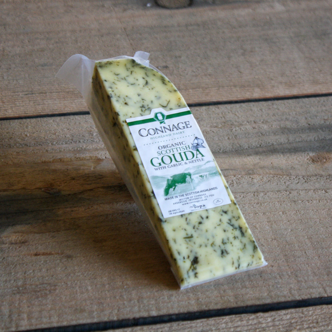 vac packed wedge of organic scottish gouda with garlic and nettles