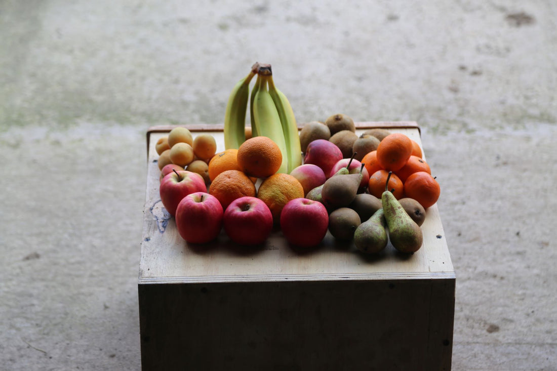 A series of photos showing the Large Fruit Box. Contains approximately 7-9 varieties of fruit. Great as a supplement to a veg box for a large household, for the office, or for the kids....